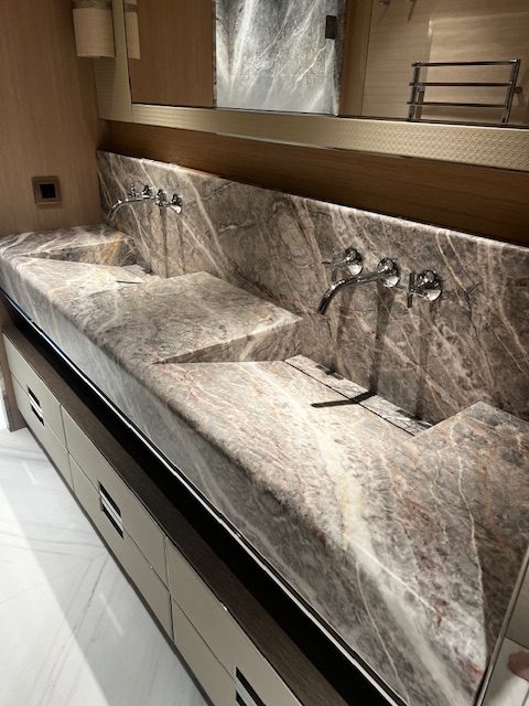 Matte PPF protection on marble bathroom surface in superyacht